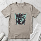 Heather Dust Bella + Canvas 3001 Christian graphic t-shirt featuring bold “Made New” typography with modern hand-drawn accents and teal geometric background elements. 'Made new' shirt, Christian graphic tee, Christian shirt women, faith based apparel, Christian boutique clothing. Shirt made by Eternal Thread Apparel.