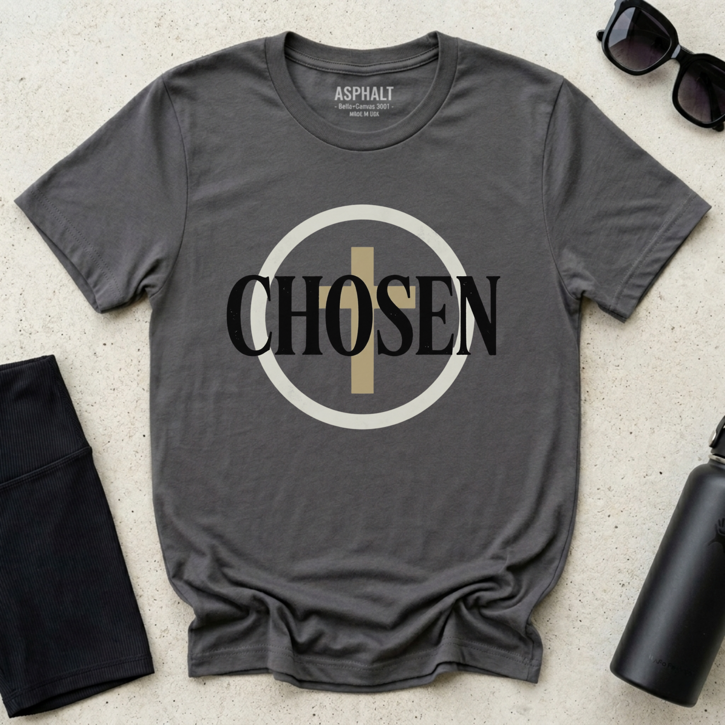 Minimalist Christian “Chosen” graphic t-shirt in Asphalt gray featuring bold black typography with a modern cross-inspired circular design.