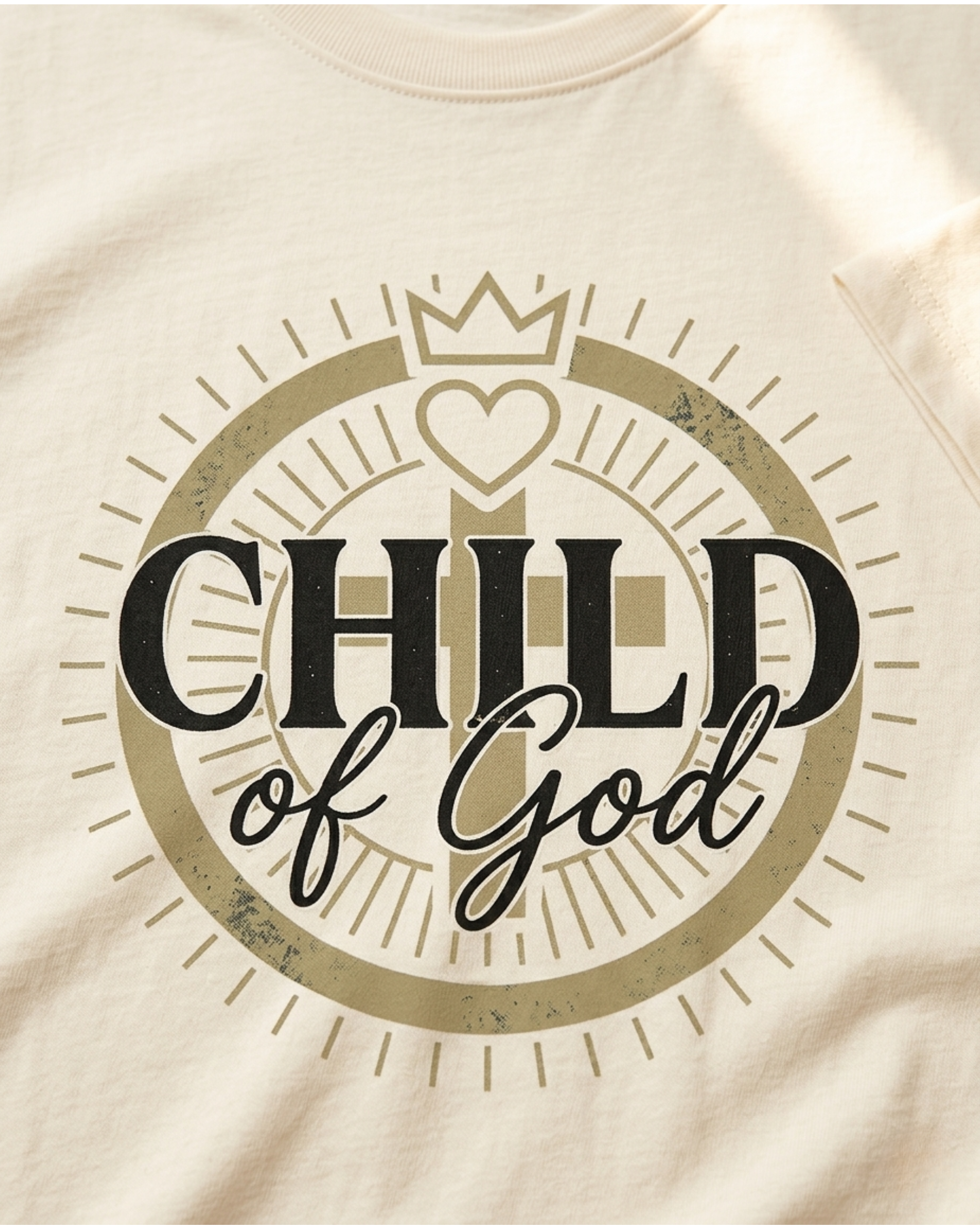 Zoomed in detail shot of the "Child of God" Modern Christian t-shirt sold by Eternal Thread Apparel, in Vintage White and two other colors.