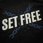 Zoomed in detail shot of the 'SET FREE' Christian t-shirt with chain designs, on a Black shirt. Sold by Eternal Thread Apparel, available in Black and two other colors.