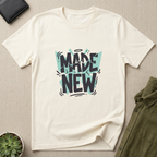Vintage White Bella + Canvas 3001 Christian graphic t-shirt featuring bold “Made New” typography with modern hand-drawn accents and teal geometric background elements. 'Made new' shirt, Christian graphic tee, Christian shirt women, faith based apparel, Christian boutique clothing. Shirt made by Eternal Thread Apparel.